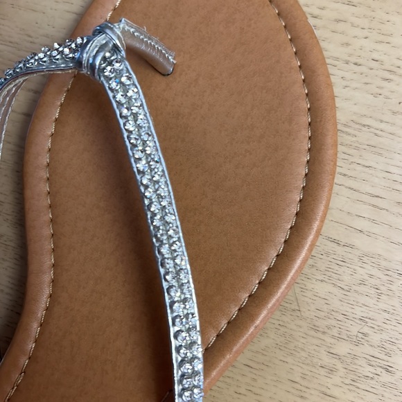 Silver strapped Flip Flops. Flat heels. Size 10 Rhinestone BLING on straps. - Picture 2 of 5